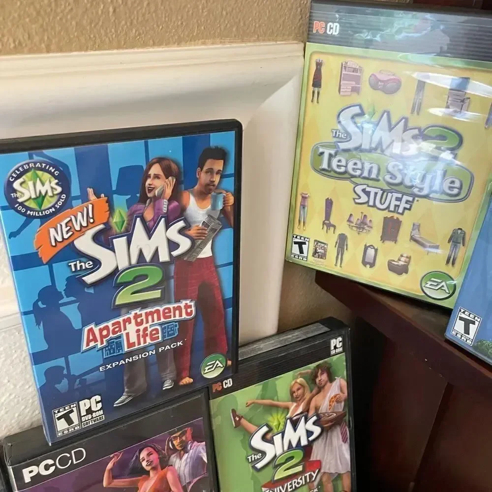 The SIMS PlayStation Vintage Side Video Game Lot PC DVD Pets Family Delux Sets